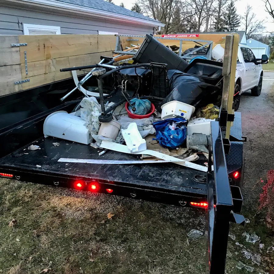 Roll-off dumpster delivered to a residential driveway in Upper Darby